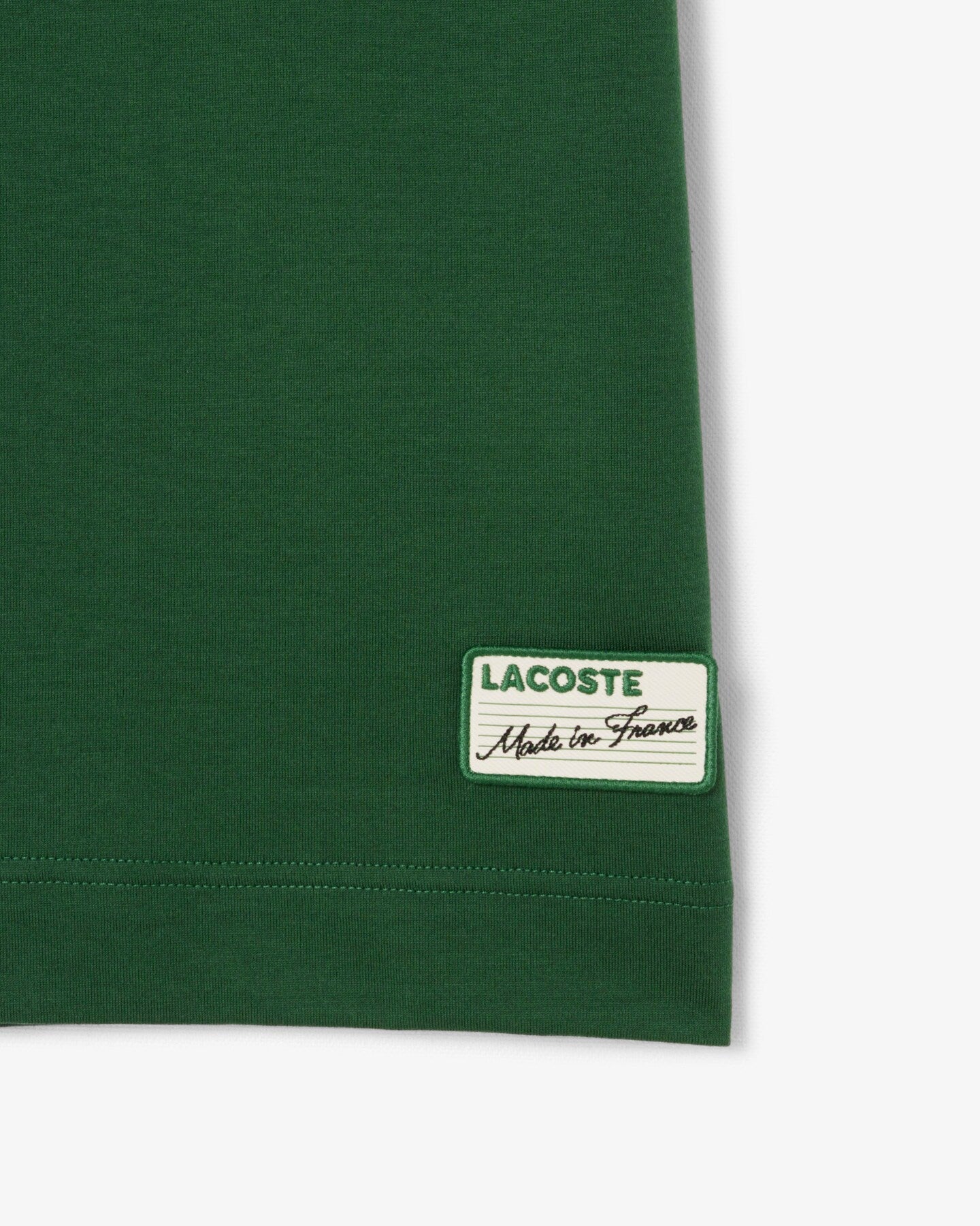 LACOSTE - Camiseta con cuello de rayas fabricada en Francia